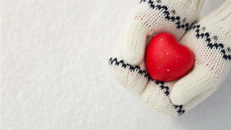 Hands holding red heart