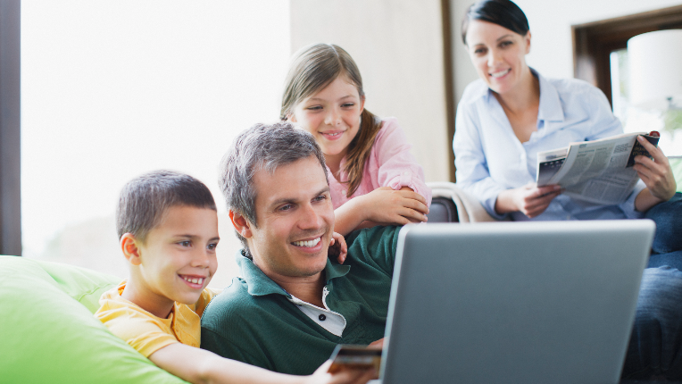 Family using laptop together