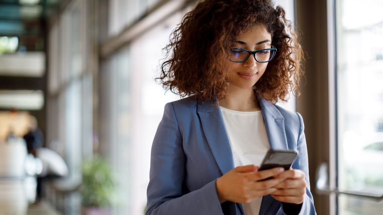 A woman looking at her cellphone