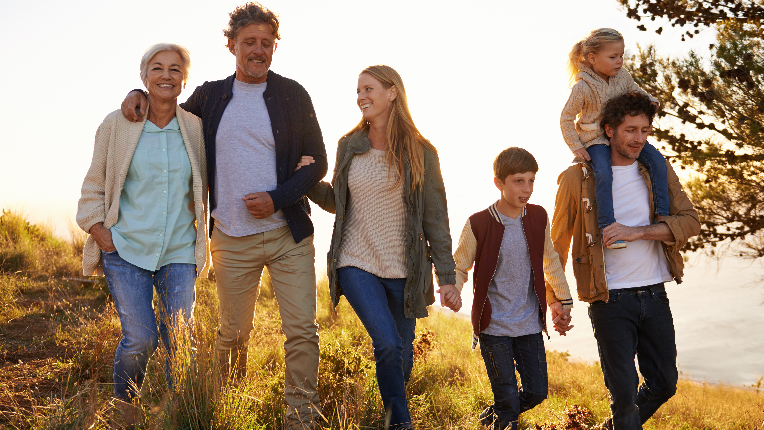 Shot of a happy family out on a morning walk together.