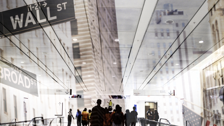 Crowded Wall Street in New York City.