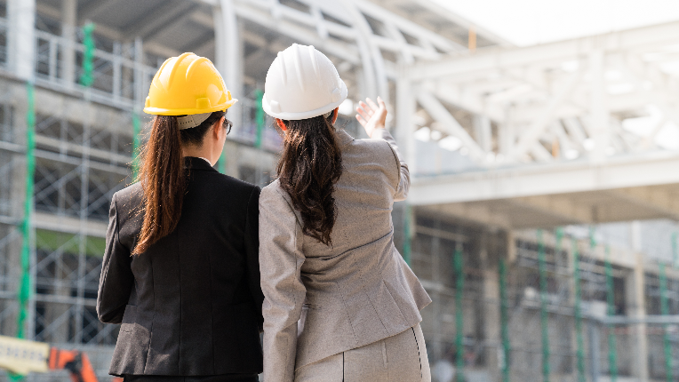 Female engineer showing a building project
